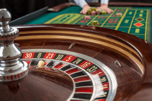 Casino roulette table with gambling chips